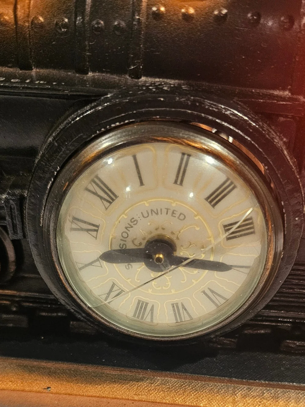 United Metal Train Clock Black and Cooper with Stained-Glass Window
